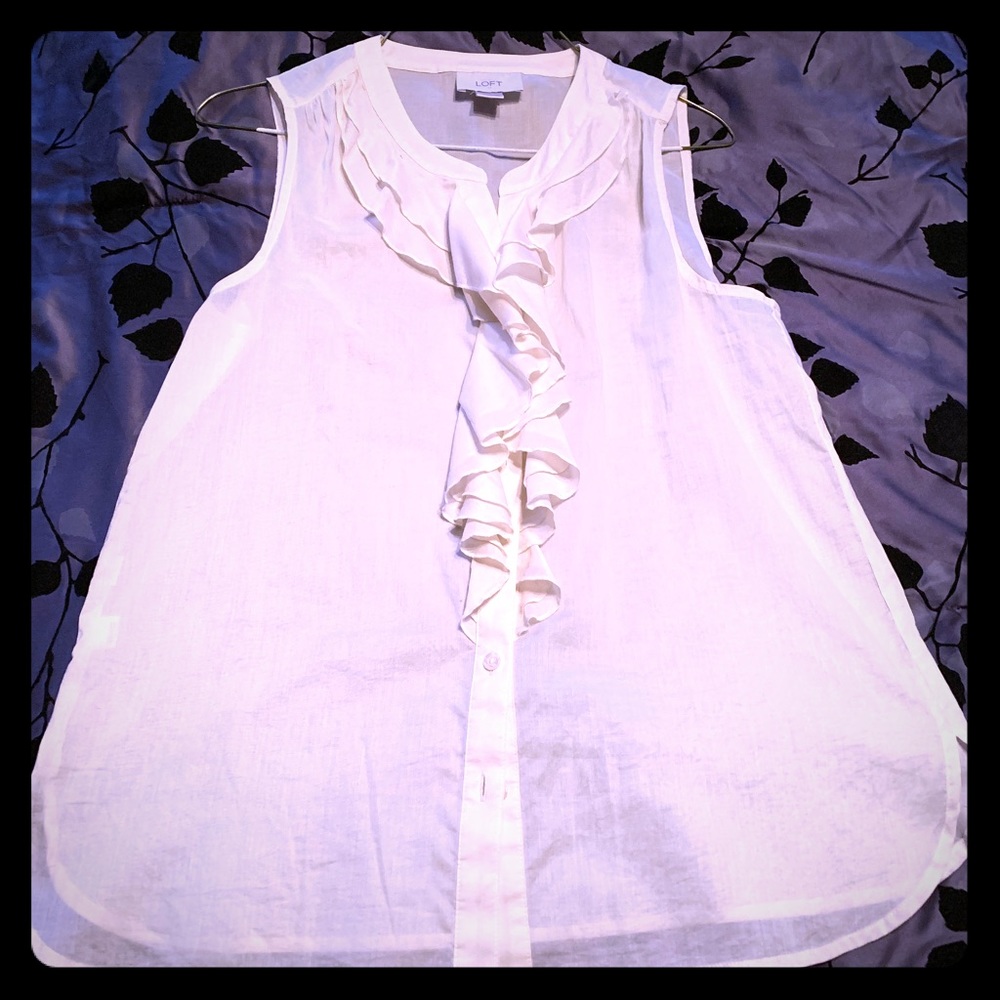 Cream sleeveless blouse